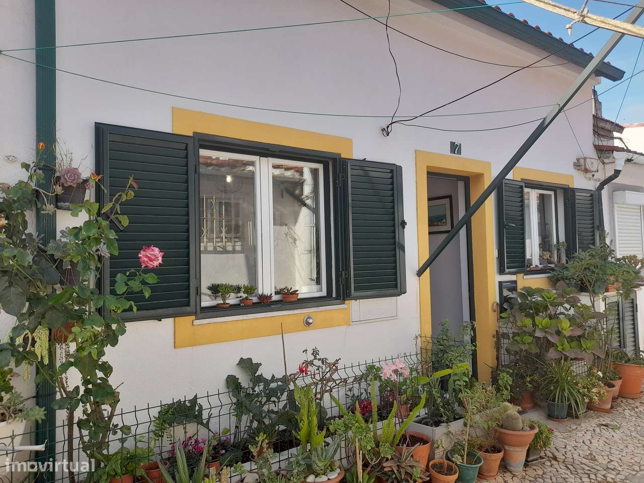 Moradia T1 com sótão e jardim em Campo de Ourique-19