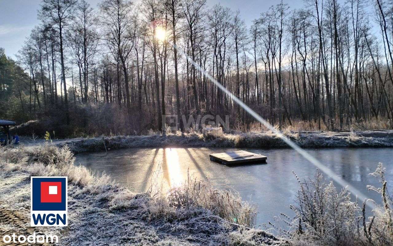 Posiadłość ze stawem z domem w budowie .-11
