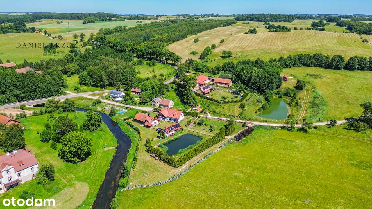 Wyjątkowa posiadłość nad rzeką z prywatnym lasem z 6 ha działką-1