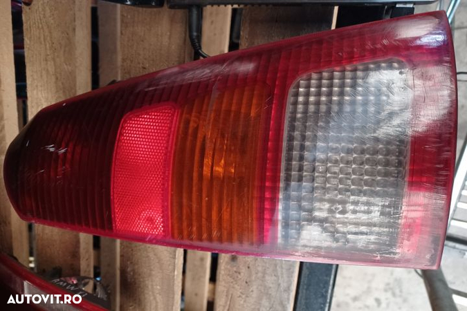 Lampa stop stanga pe aripa Ford Focus 1  [din 1998 pana  2004] seria Hatchback 3-usi 1.4 MT (75 hp) - 2