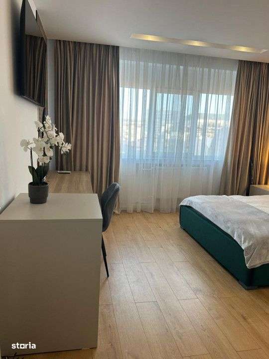 ULTRACENTRAL | UNIVERSITATE| GARSONIERA MOBILATA SI UTILATA LUX - Imagine principală: 2/15