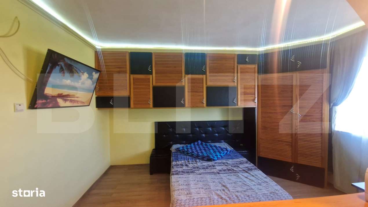 Garsoniera mobilata, etaj intermediar, parcare, beci luminoasa - Imagine principală: 4/13