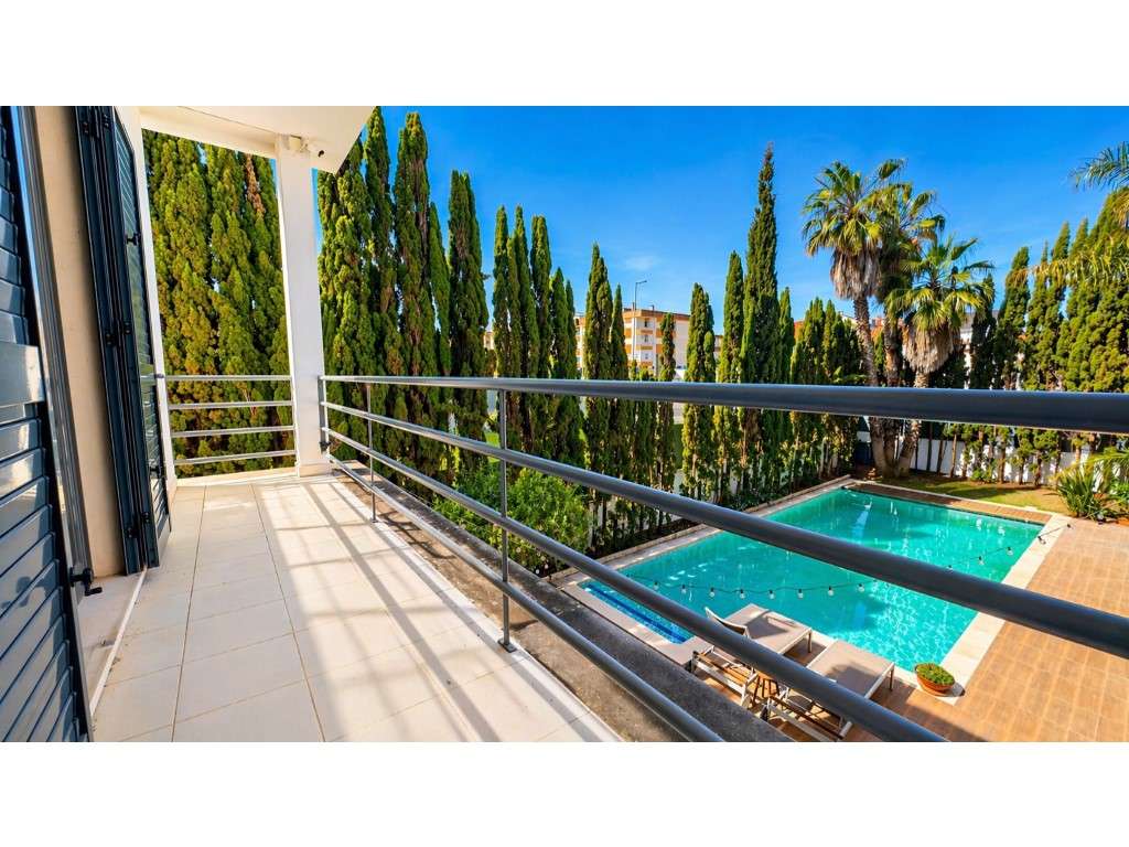 Moradia T4 isolada com piscina privada, jardim, garagem e 595 m² de...-33