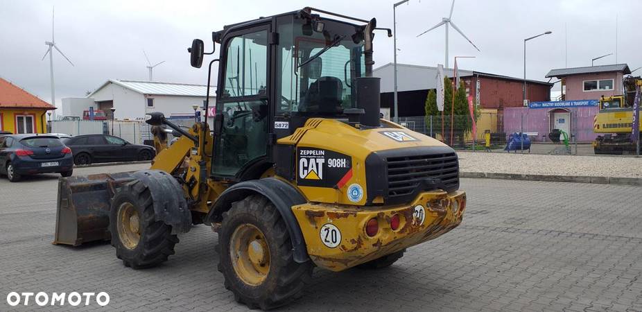 Caterpillar Ładowarka kołowa CATERPILLAR 908 H 2 - 7