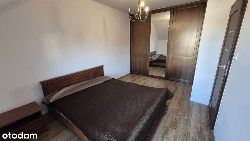 dwupoziomowe z ogródkiem i garażem na Plewiskach-11