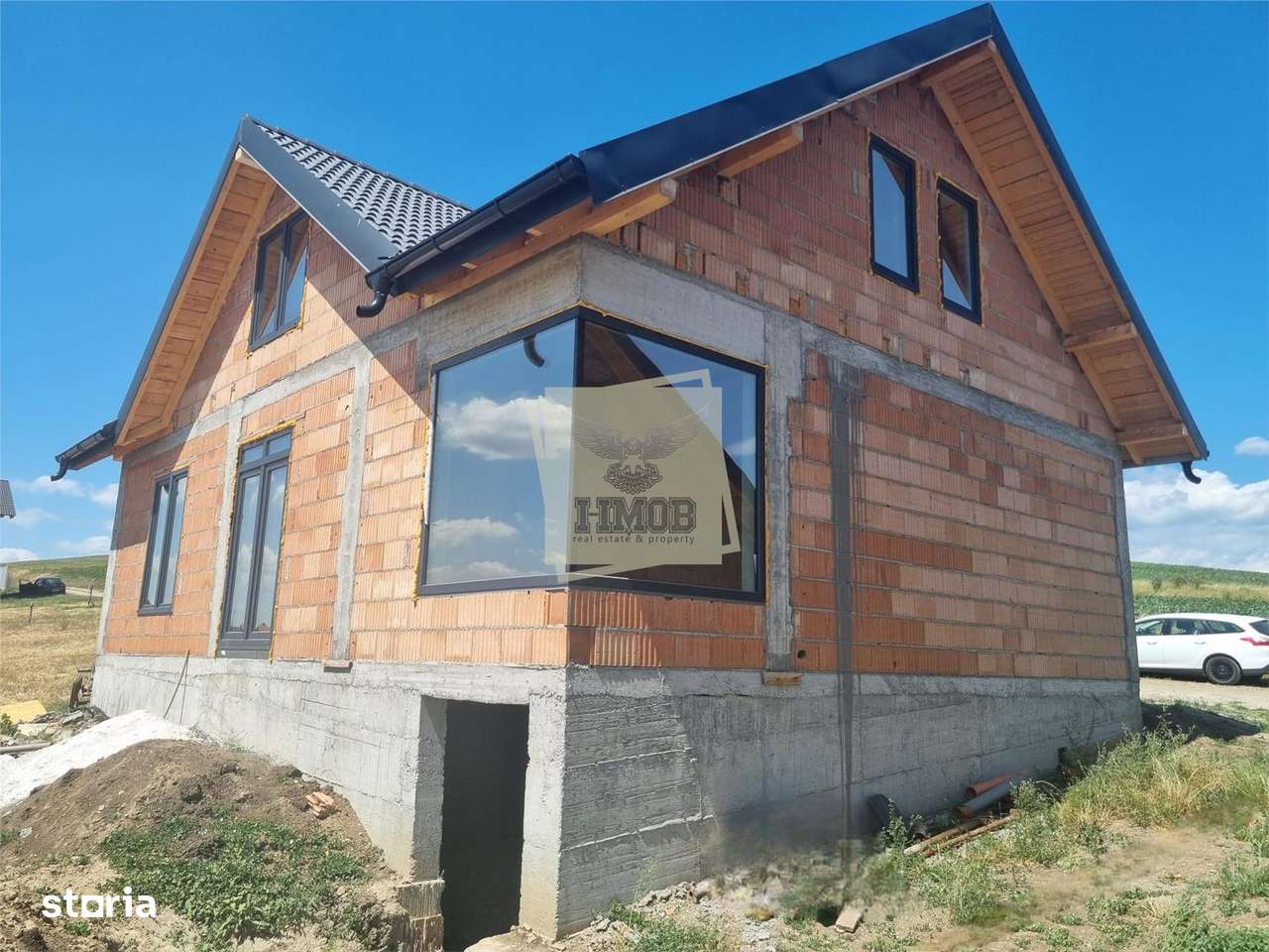 Casa cu 4 camere 2 bai 180 mpu in zona Sura Mare - Imagine principală: 1/16