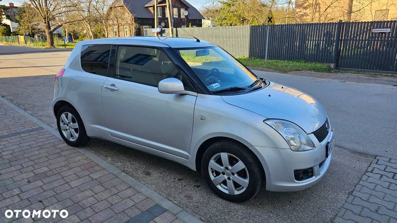 Suzuki Swift 1.3 GLX / Comfort - 31