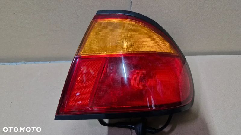 MAZDA 323 94-98 LAMPA TYŁ PRAWA NOWA DEPO - 1