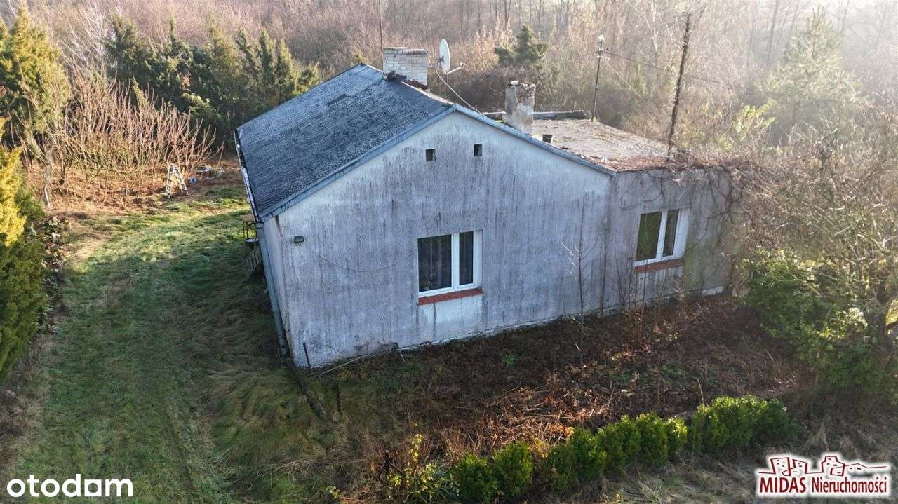 Dom do remontu na ładnej działce-6