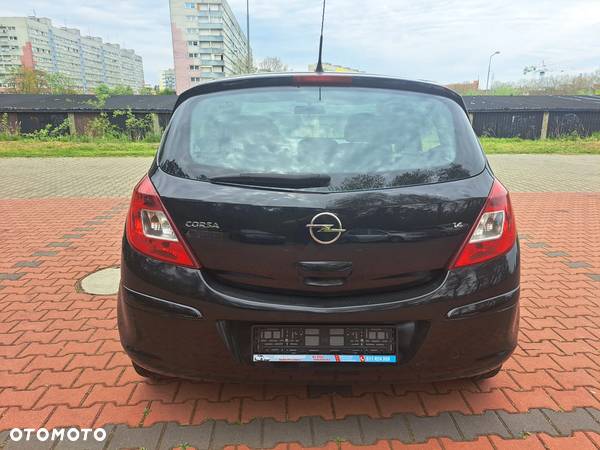 Opel Corsa 1.4 16V Enjoy - 21