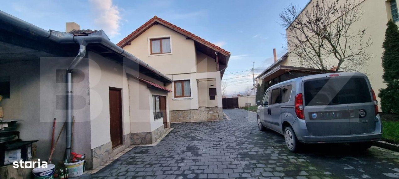 Casa cu 3 camere, 120 mp utili pe un teren de 1200 mp, zona centrala