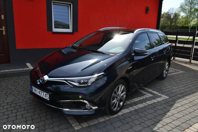 Toyota Auris 1.8 VVT-i Hybrid Automatik Touring Sports Executive - 1