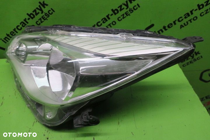 SUBARU TREZIA REFLEKTOR LEWY 2011 2012 2013 2014- - 2