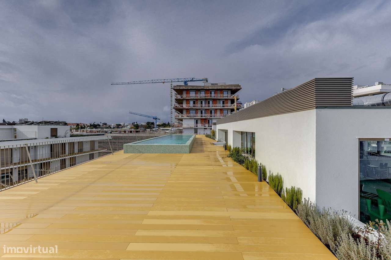 Luxo Contemporâneo em Miraflores: T1 Novo com Varandas, Piscina e Giná - Grande imagem: 4/30