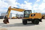 Cat M 320 F - 5