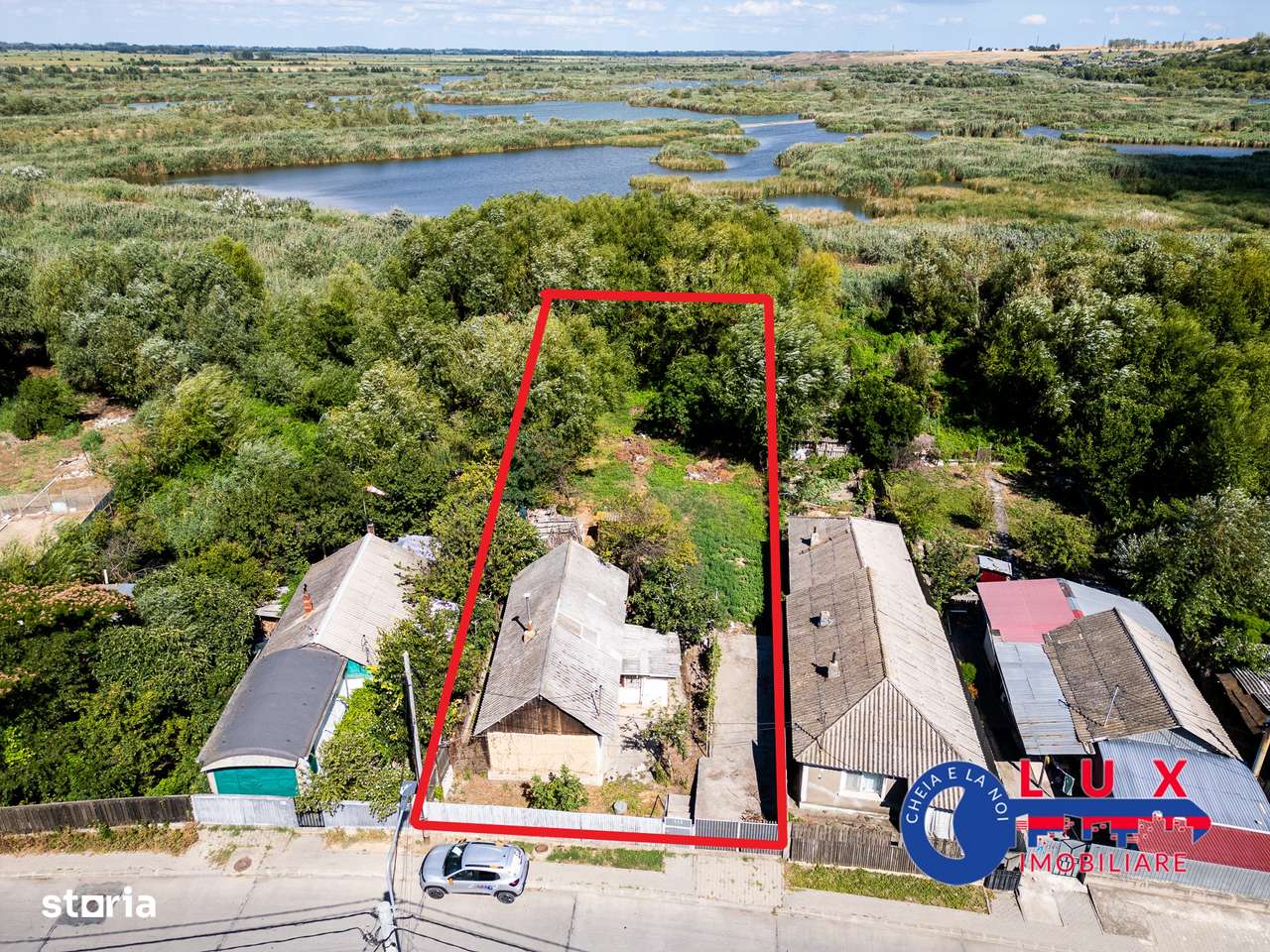 ID 7854 EXCLUSIVITATE – Teren cu casă și ieșire la canal - Imagine principală: 2/9