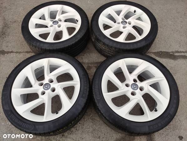 4x100 Felgi Aluminiowe Alufelgi 17 Koła Letnie Lato OPEL CORSA D E ADAM ASTRA G H FIAT GRANDE PUNTO Punto Evo Białe Legnica ALU-RAD 215/45 - 1