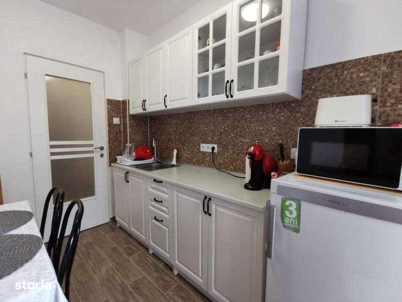 Apartament 3 camere decomandat zona piata centrala, et. 5 din 10, 60mp - Imagine principală: 5/8