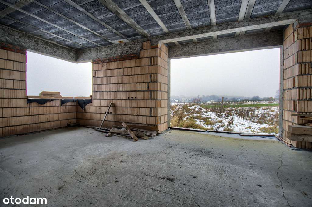 Nowoczesny dom parterowy w stanie surowym otwartym - Pełny obrazek: 1/12