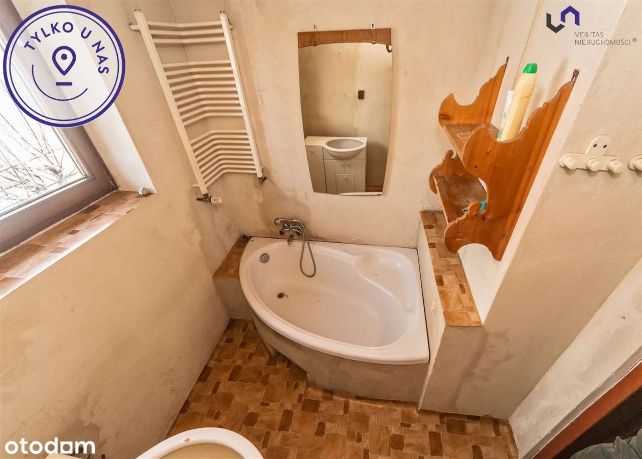 Dom z dwoma niezależnymi mieszkaniami w centum-12