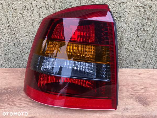 OPEL ASTRA G II 2 98-09 LAMPA LEWA TYLNA TYŁ HB 5D - 1