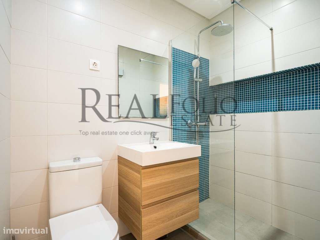 Apartamento T1 remodelado com varanda na Costa da Caparica-7
