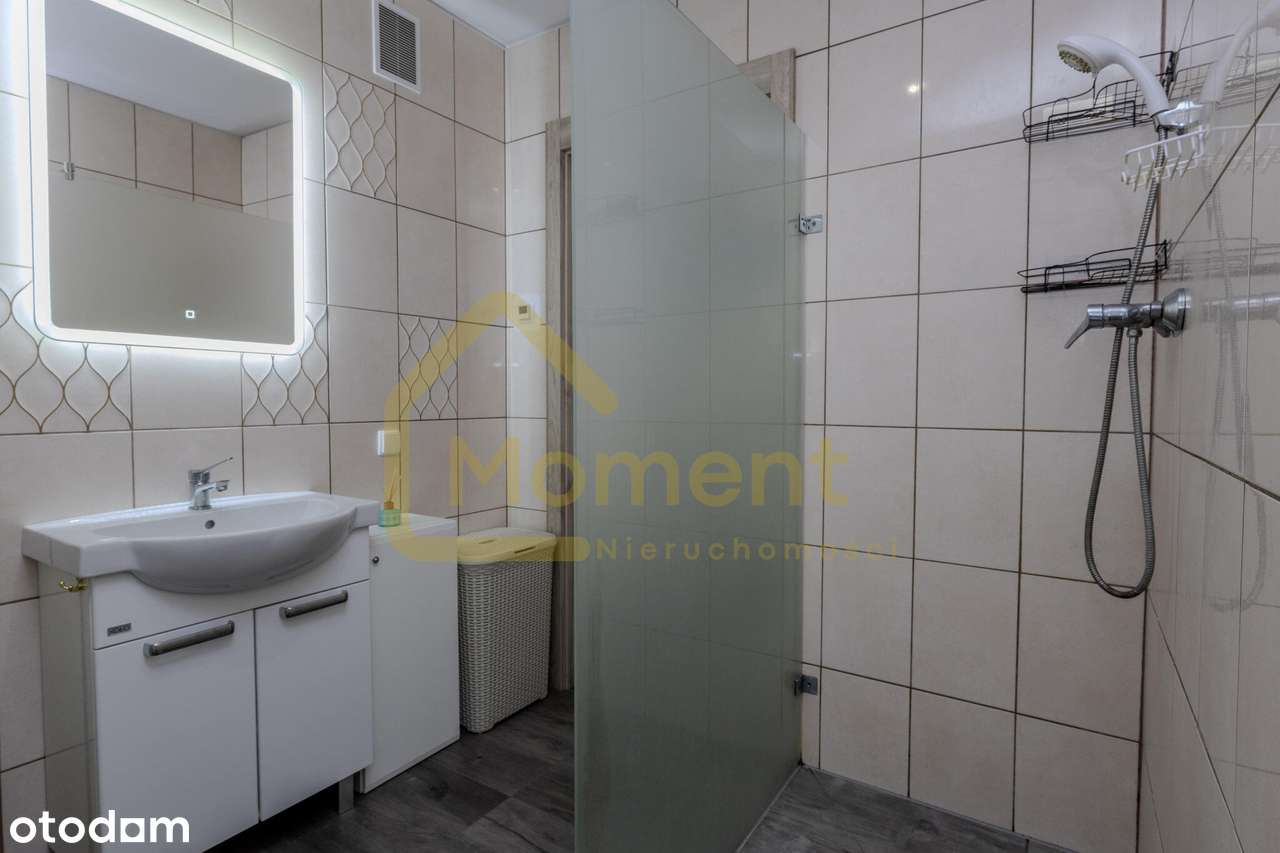 Ekonomiczny dom z garażem i pięknym ogrodem-17