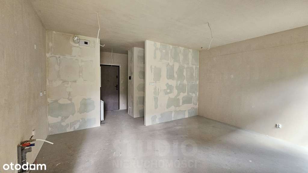 Z ogródkiem 1 pok. Stan deweloperski Garaż-3