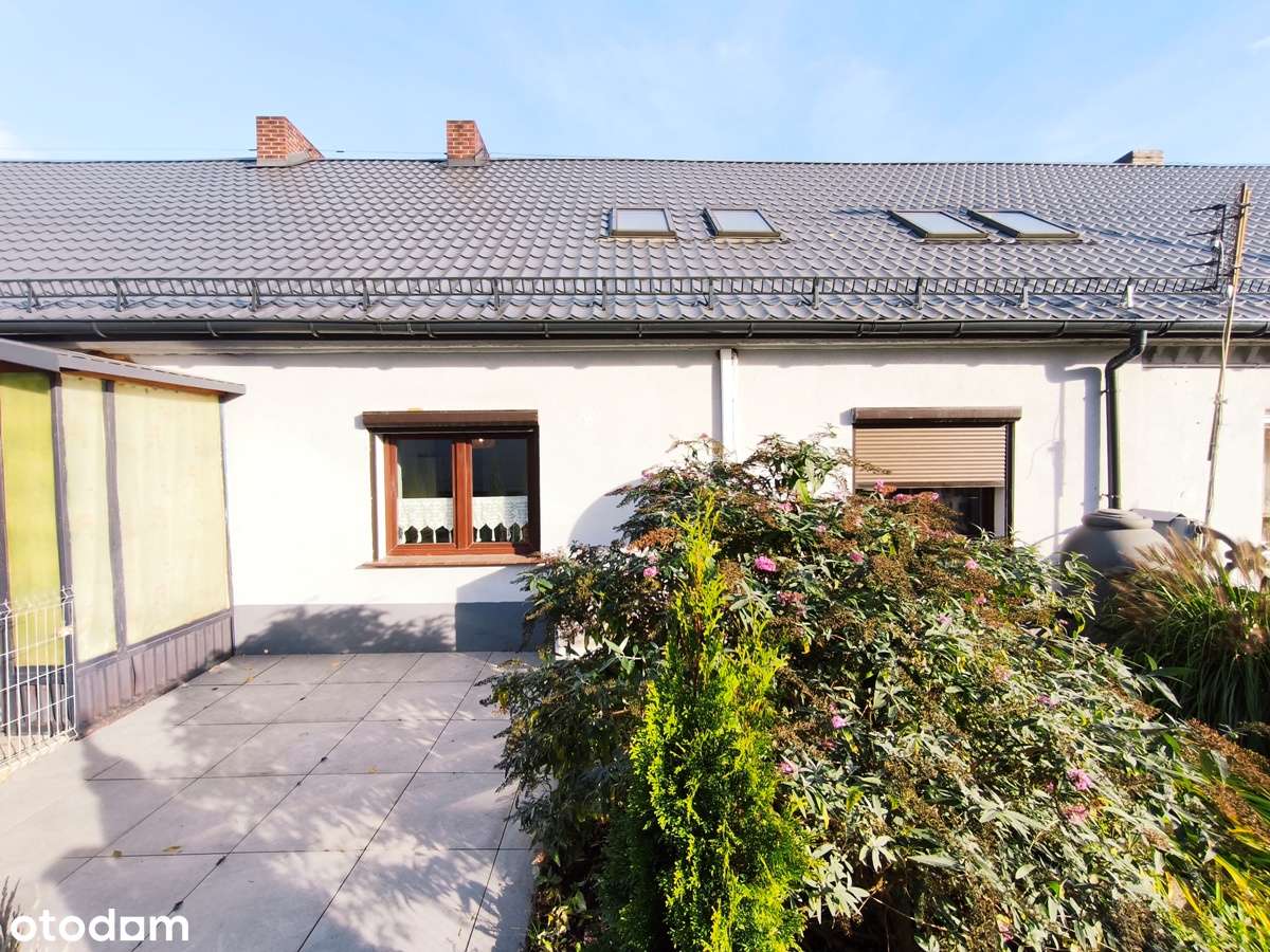 Dwupoziomowe mieszkanie z ogródkiem, Konin-Maliniec-1