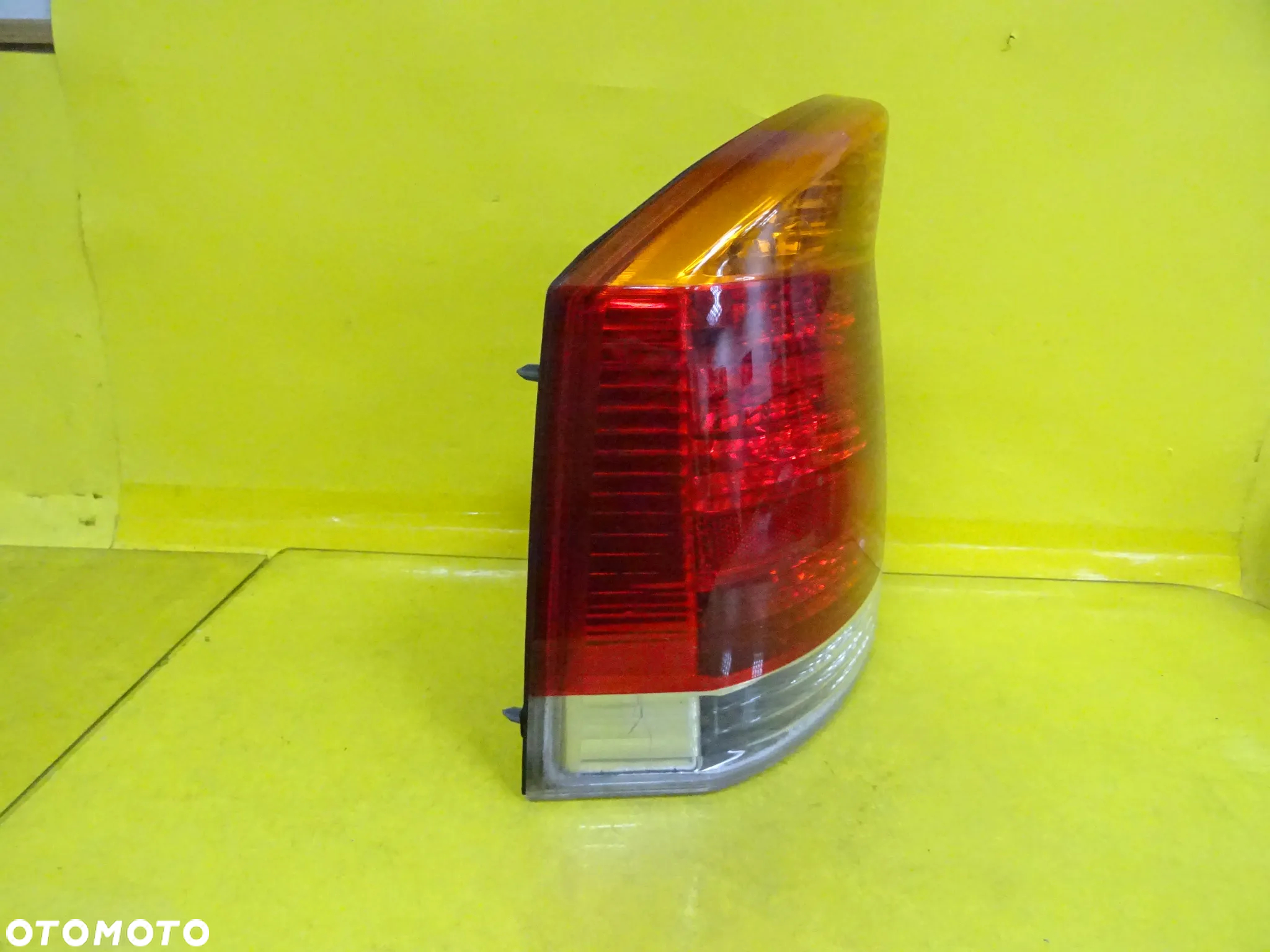 LAMPA LEWY TYŁ OPEL VECTRA C SEDAN 02-05 13130643 NR242 - 2