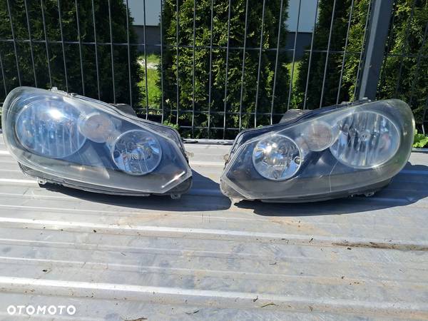 Volkswagen Golf 6 VI lampa przednia przód prawa lewa - 1