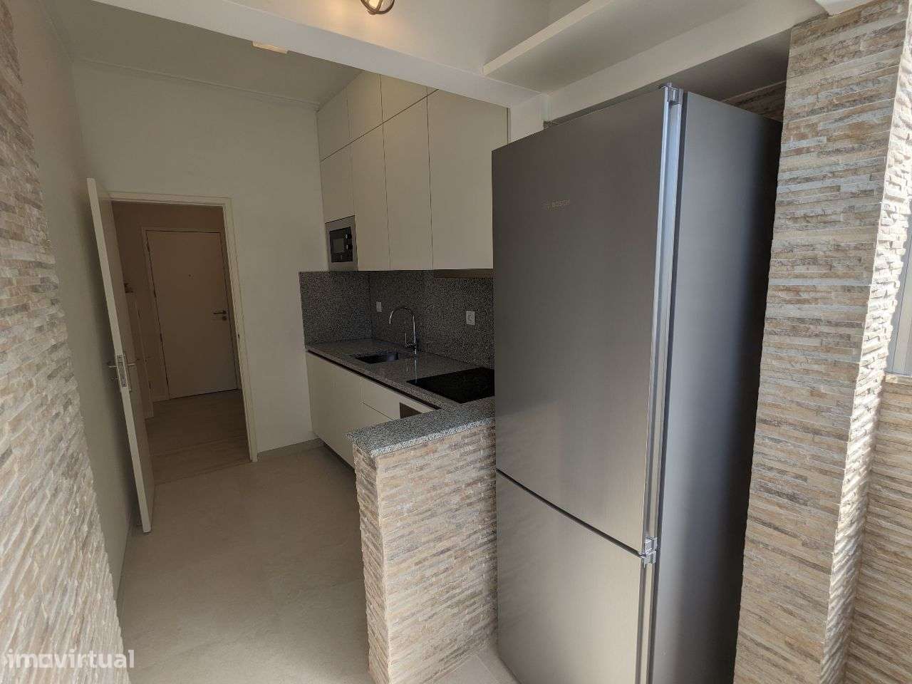 Apartamento para arrendar em rua Óscar da Silva - Grande imagem: 2/9