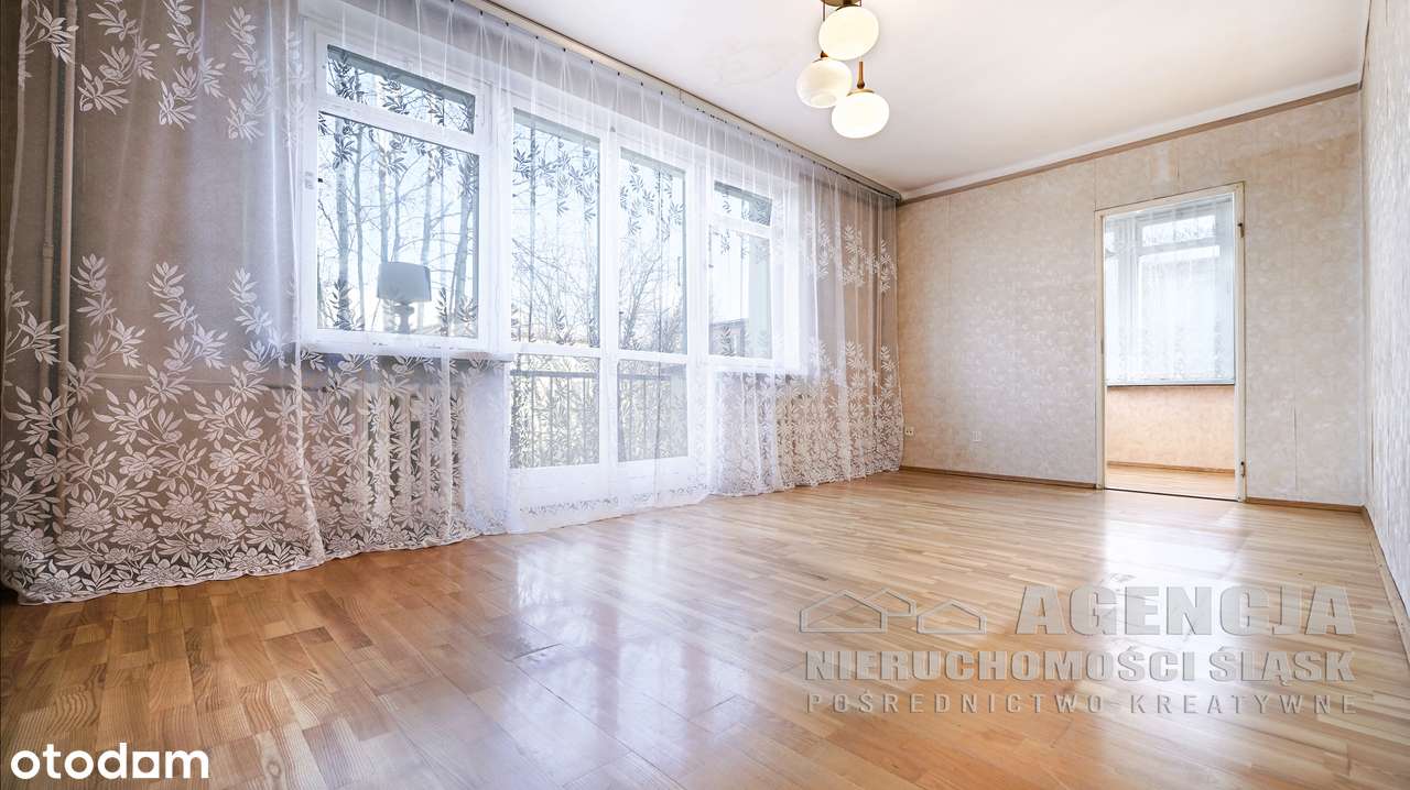 Przestronne 4-pokojowe mieszkanie z balkonem-0