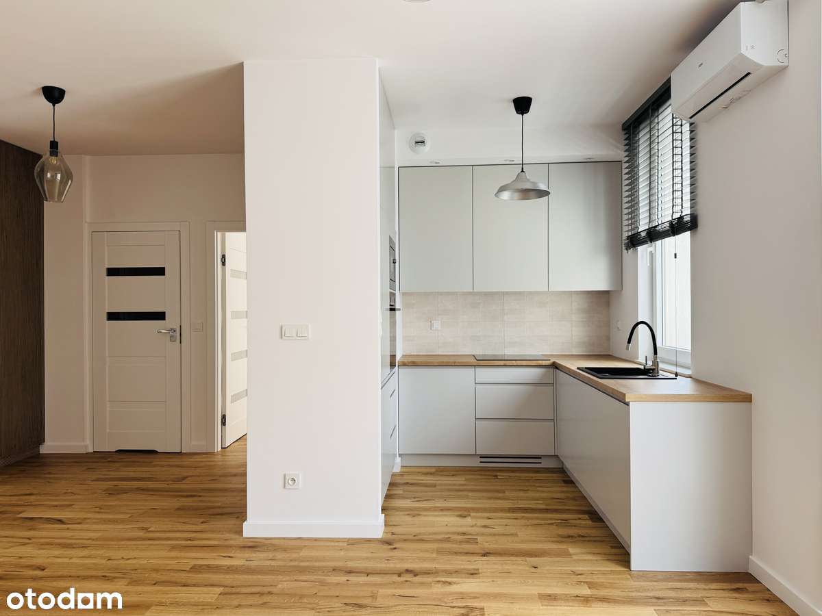 Świeżo wykończone 2 pokoje do wprowadzenia z klimatyzacją i garażem-0