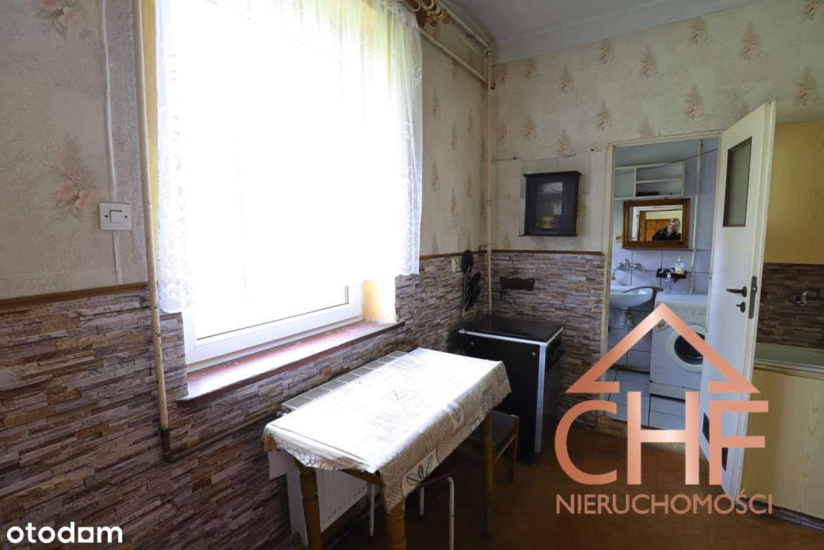 Dom parterowy z pomieszczeniami gospodarczymi-11