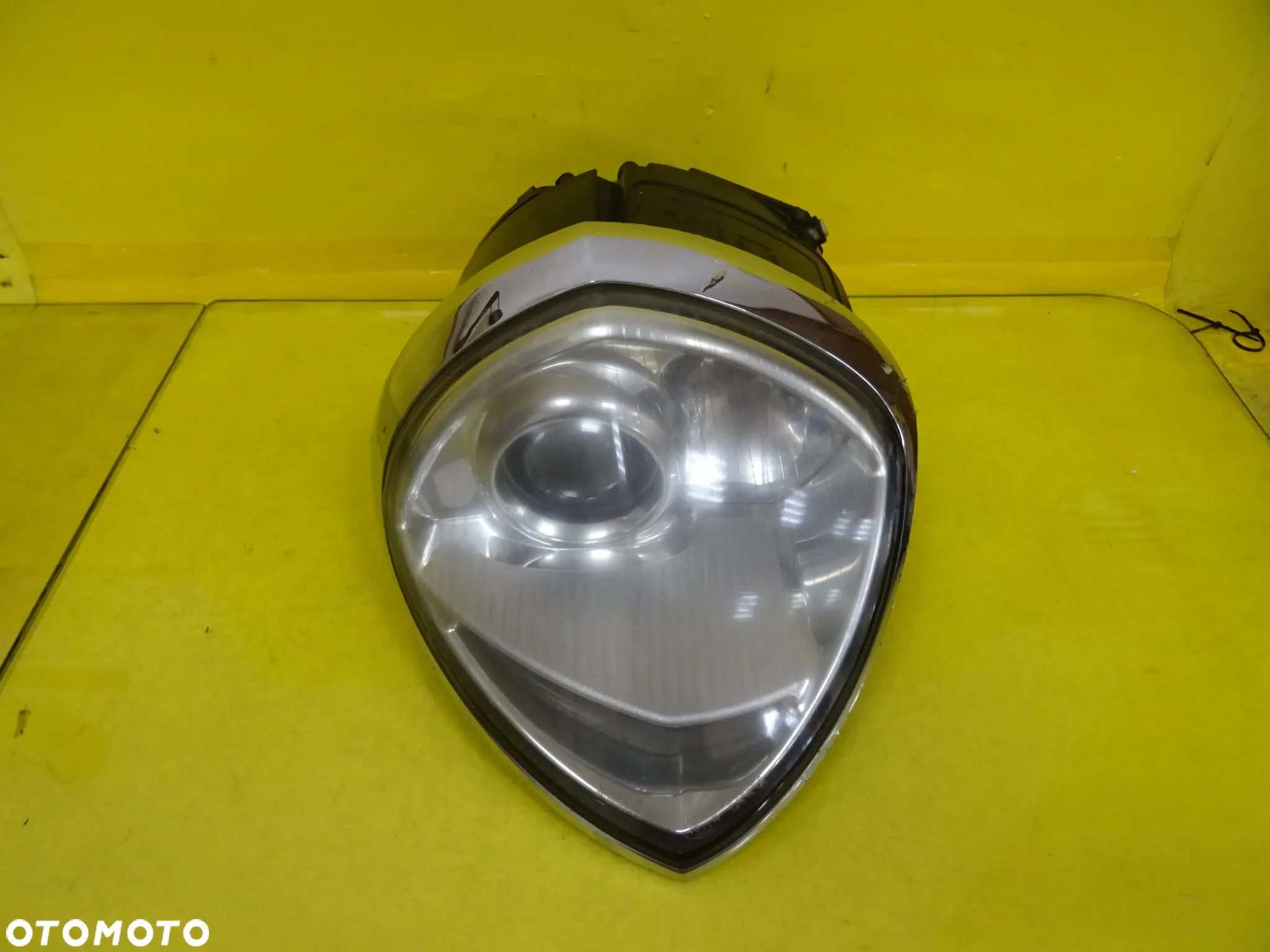 REFLEKTOR LAMPA PRAWA XENON HELLA LANCIA THESIS 154926-00 NR215 - 1