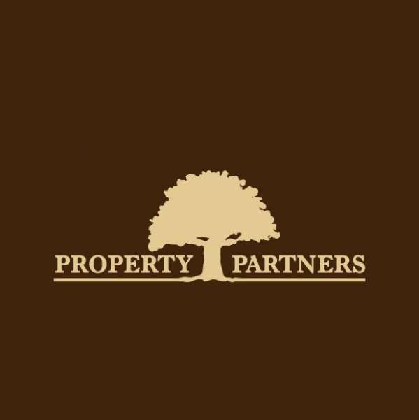 Logo: PROPERTY PARTNERS Tomasz Chłopaś