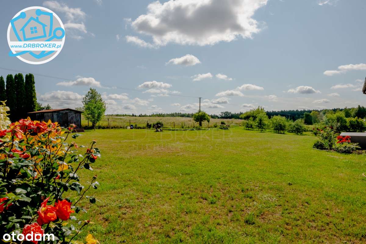 Dom z piękną działką i wolnostojącym garażem-14