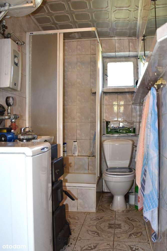 Mieszkanie 2 pokoje 1p., 2 garażami i ogródekiem-10