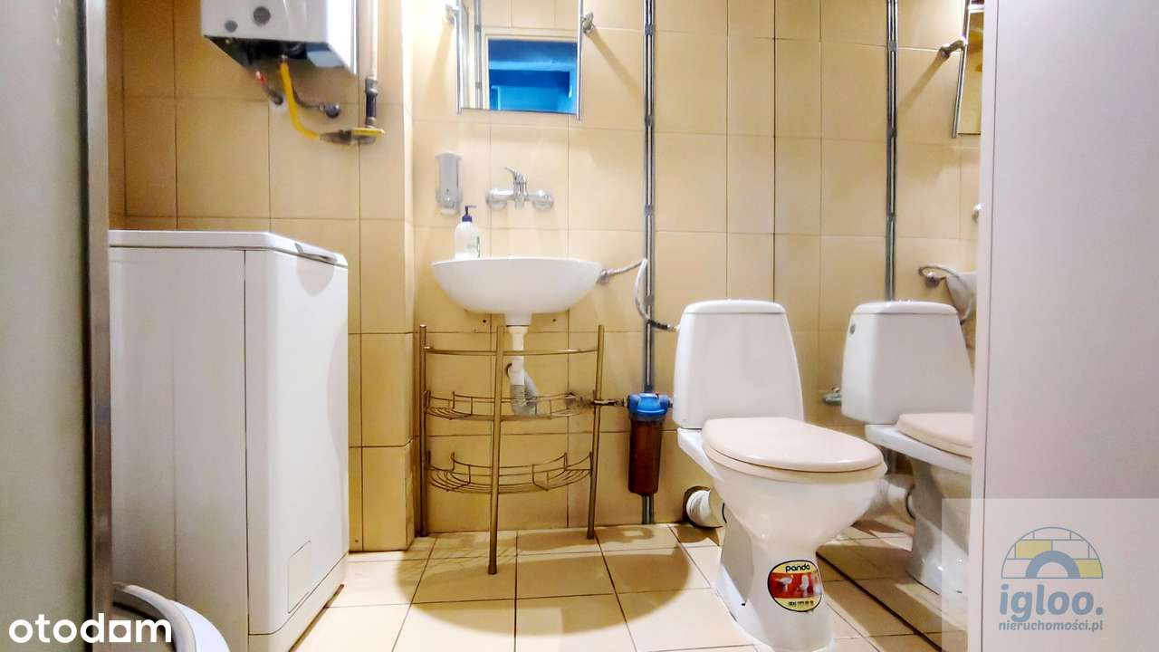 Kawalerka z duża oddzielną kuchnią winda - Pełny obrazek: 4/5