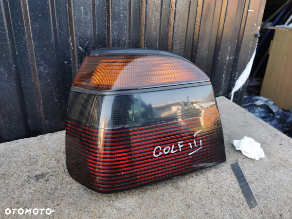 #100 Lampa tylna lewa tył black HELLA VW Golf 3 III - 4