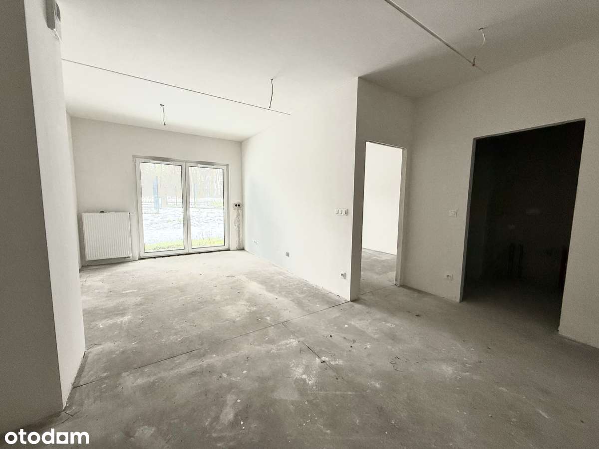 Parterowe mieszkanie 2pokojowe z ogródkiem i miejscem w hali garażowej-2