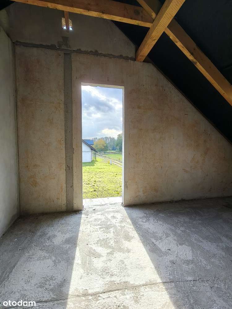 Nowoczesny dom w stanie surowym  z garażem w spokojnej okolicy-13