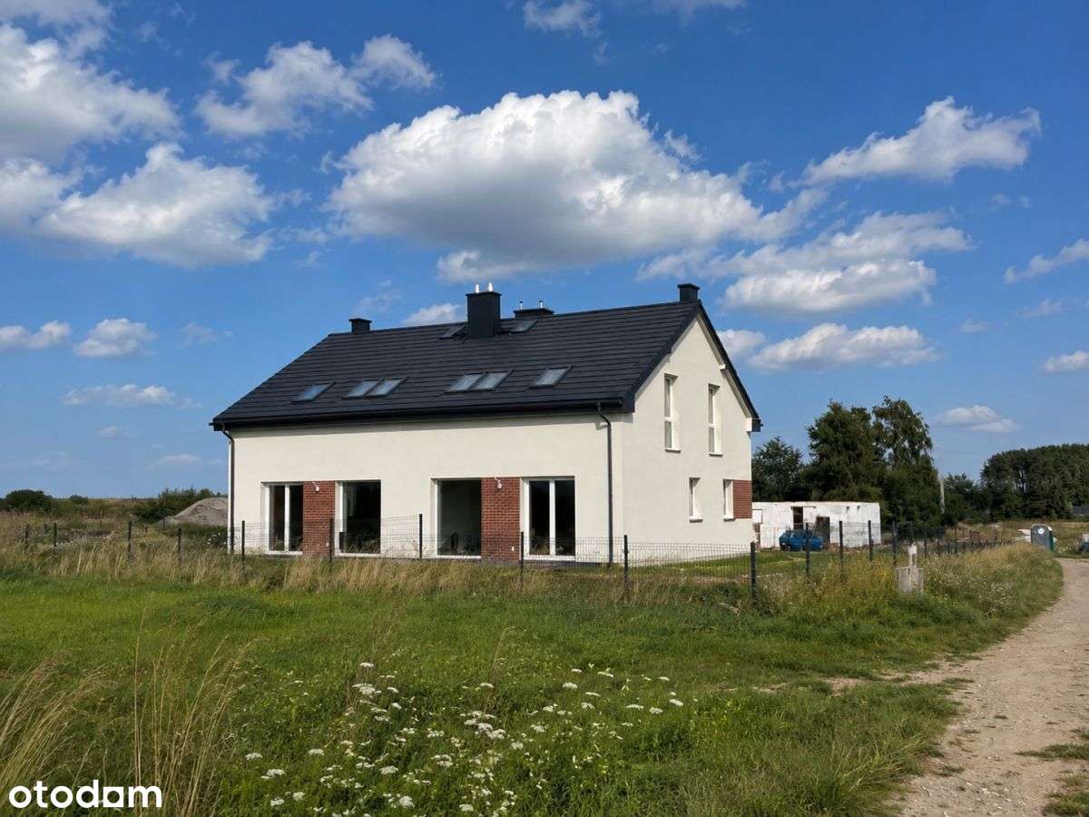 Nowy bliźniak z użytkowym poddaszem i ogródkiem –
