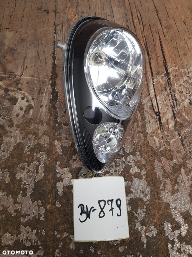 Reflektor lampa Sym Mio 50 - 1