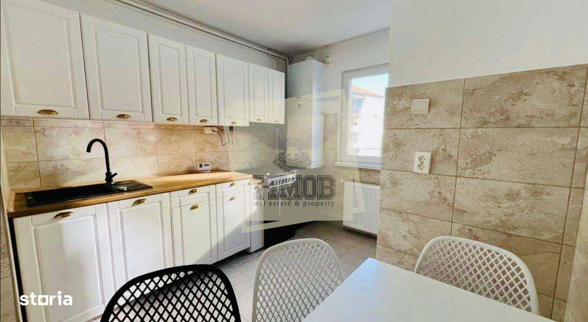 Apartament renovat etajul 2 cu 2 camere si balcon zona centrala - Imagine principală: 4/10