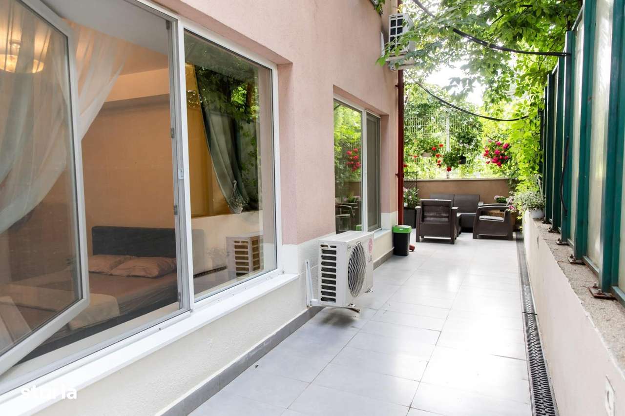 Apartament 2 camere cu terasa de 27mp - zona Herastrau - Imagine principală: 5/14