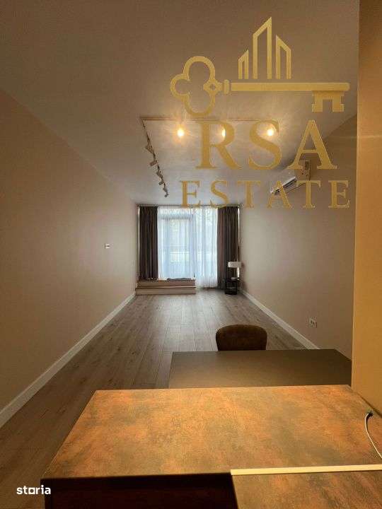 Apartament tip penthouse 2 camere, ultracentral,terasa 25mp-Ramnicu Va-2