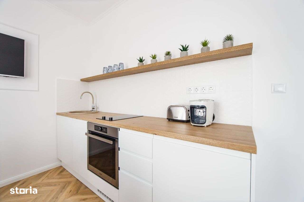 Închiriem apartament modern pe strada Făcliei - Imagine principală: 5/14