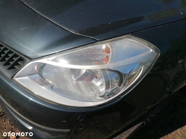 LAMPA LEWA PRAWA PRZOD CLIO III - 1